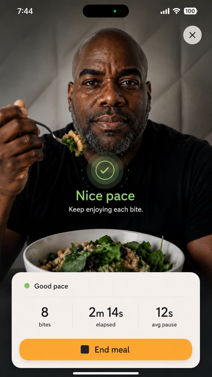 A person using MealCam while eating, with a green Nice pace message